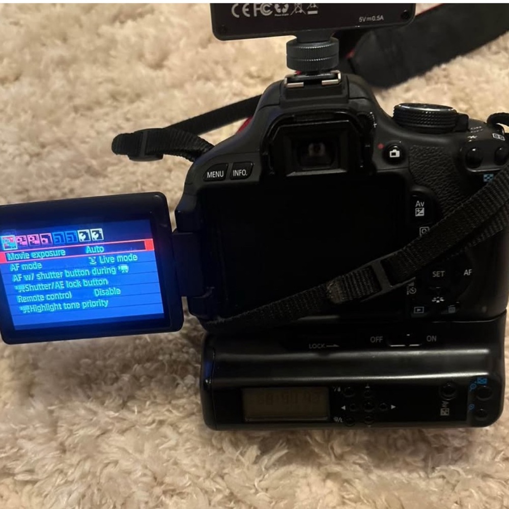Black DSLR Camera with Flip Screen
